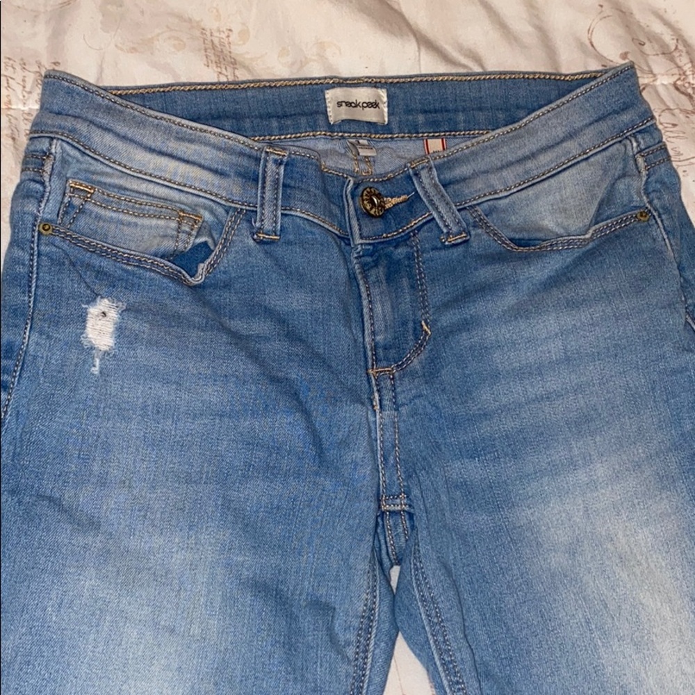 Jeans from “SneakPeak.”